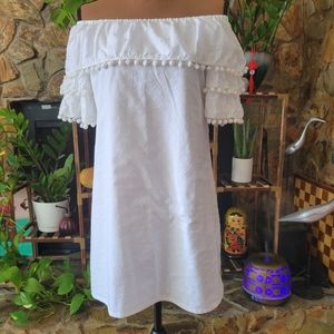Used White PrettyLittleThing Mini Off Shoulder Dress Pom Pom Fringe Size…